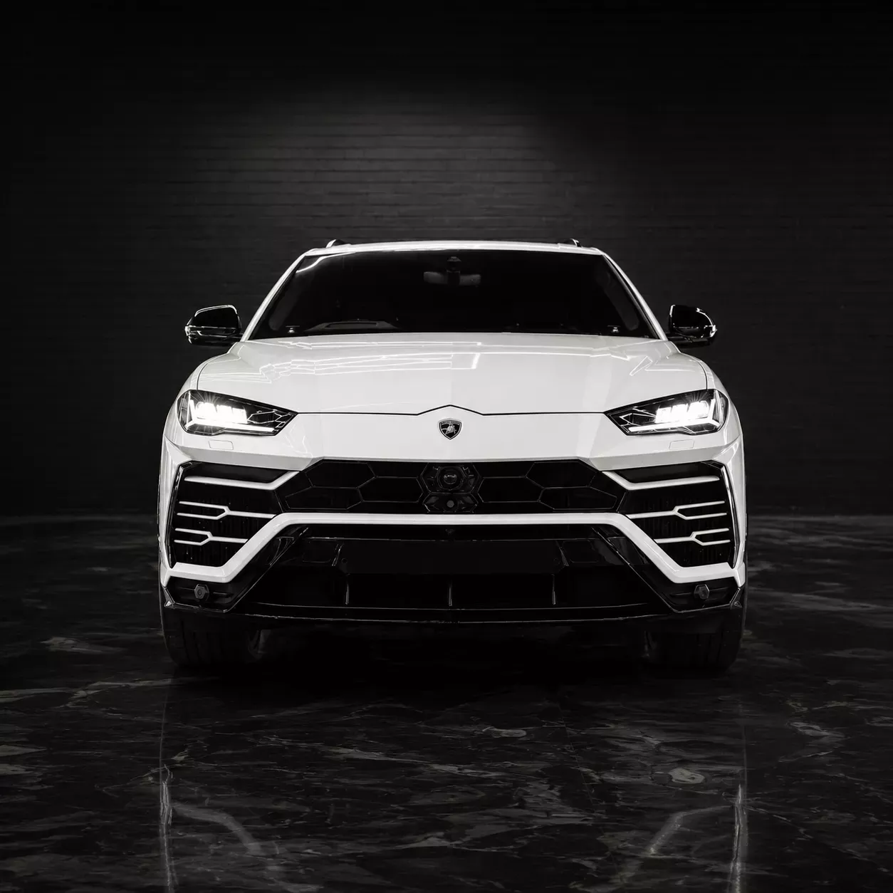 White Lamborghini Urus for executive transfers in Sydney