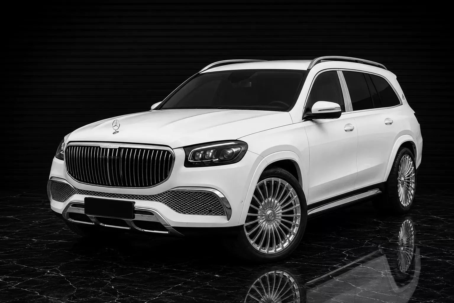 White Mercedes-Maybach GLS front three-quarter studio view for premium private chauffeur transport in Sydney