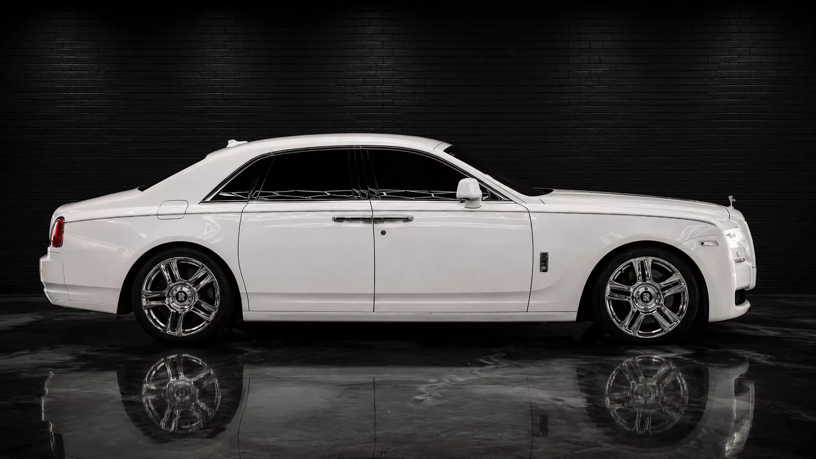 White Rolls-Royce Ghost with open rear door for private arrivals in Sydney