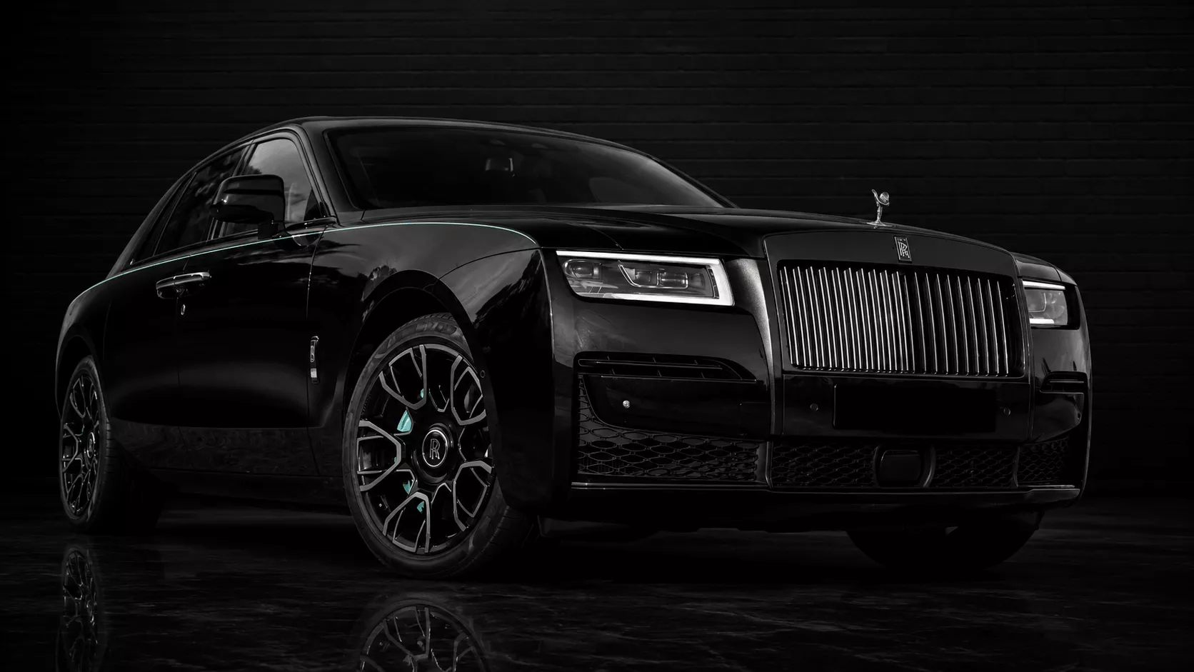 Black Rolls-Royce Ghost Series III front three-quarter studio view for premium private chauffeur transport in Sydney