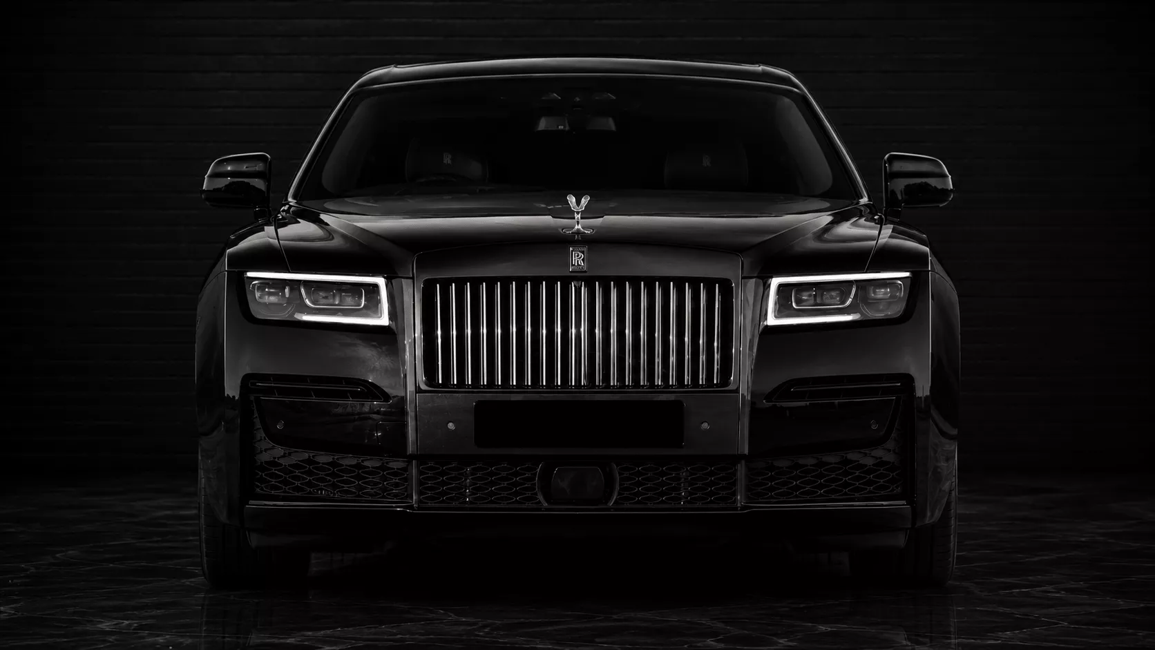 Black Rolls-Royce Ghost Series III front studio view for premium private chauffeur transport in Sydney