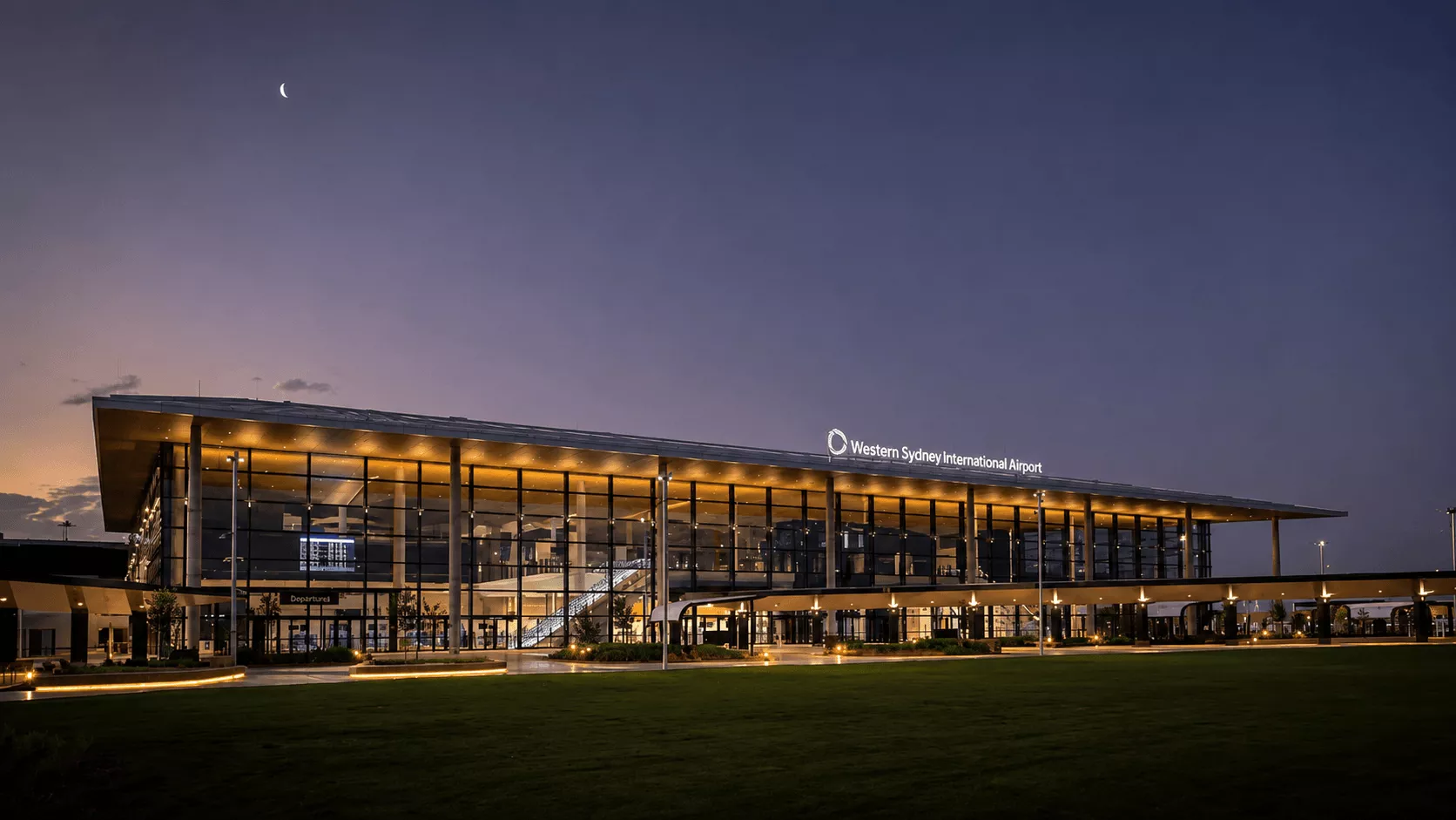 Western Sydney International Airport terminal exterior at night